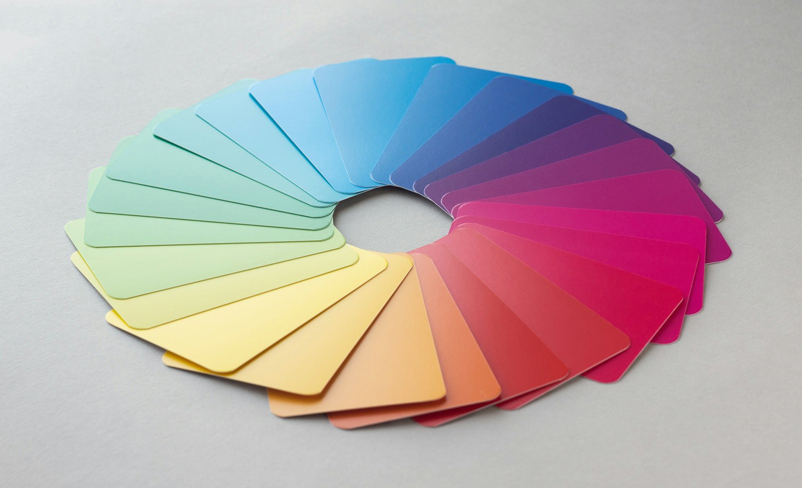 Fan of paint color swatches arranged in a circle